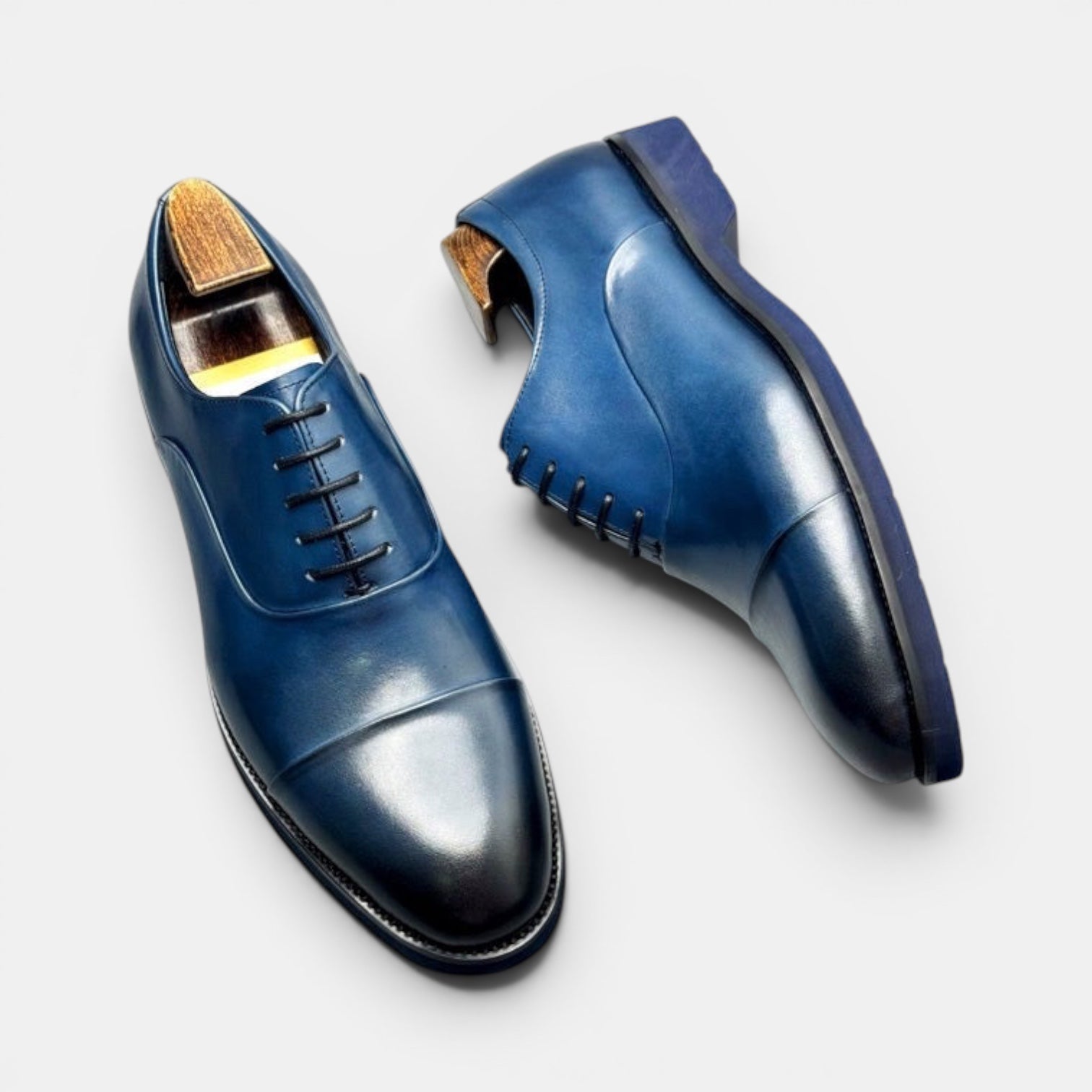 Barcon Getta Inc SAO TOME cap toe Oxford dress shoes in hand-burnished navy blue full grain leather with matching sole.