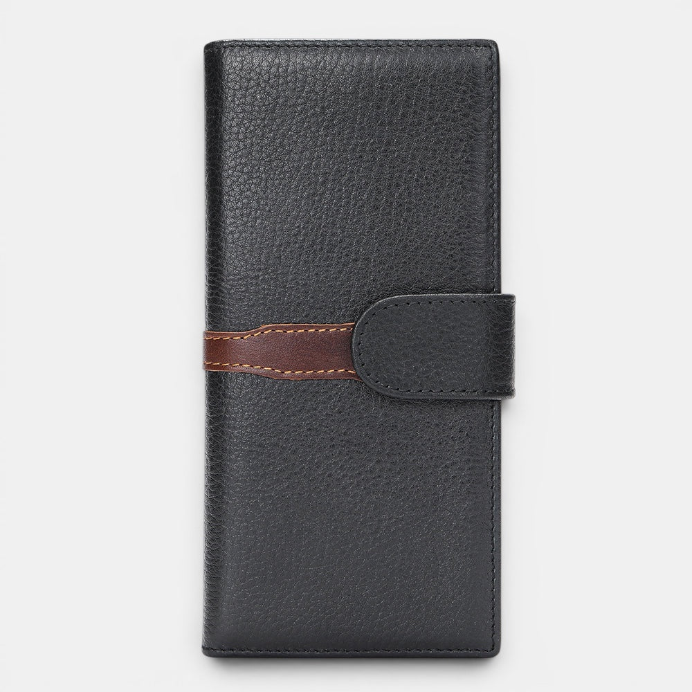 Barcon Getta Inc The Slate Long bifold wallet in black full grain leather with brown strap detail and snap closure.