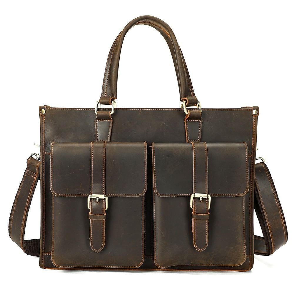 Barcon Getta Inc The Vanguard dark brown distressed leather briefcase with double front flap pockets and top handles.