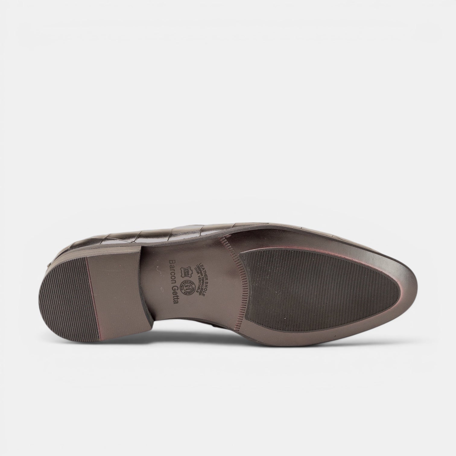 Barcon Getta Inc YAOUNDE embossed tassel loafer in deep olive/dark brown full-grain leather with croc emboss and rubber sole.