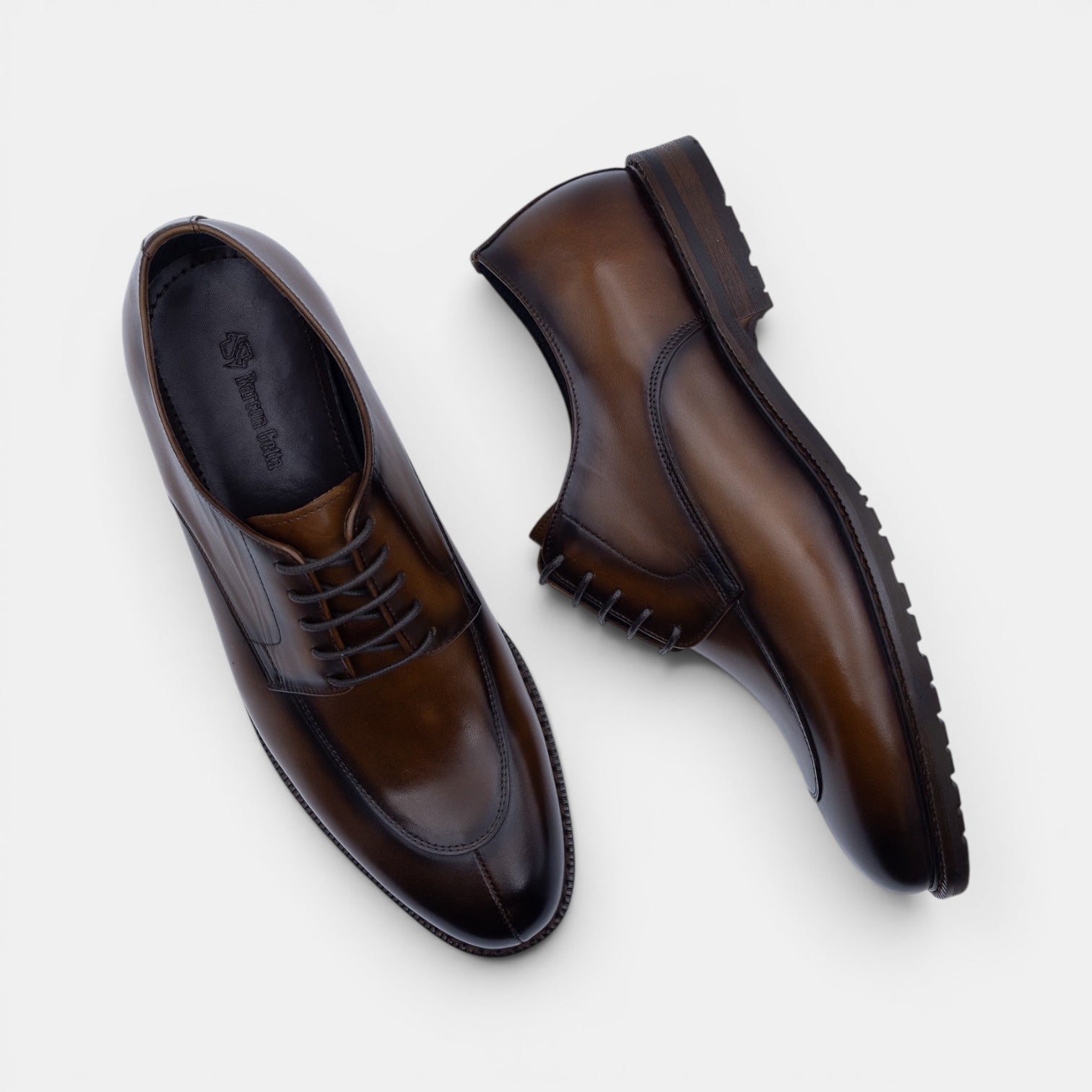 Barcon Getta Inc YOSEF A. split toe derby dress shoes in hand-burnished tobacco brown full grain leather with lug sole.