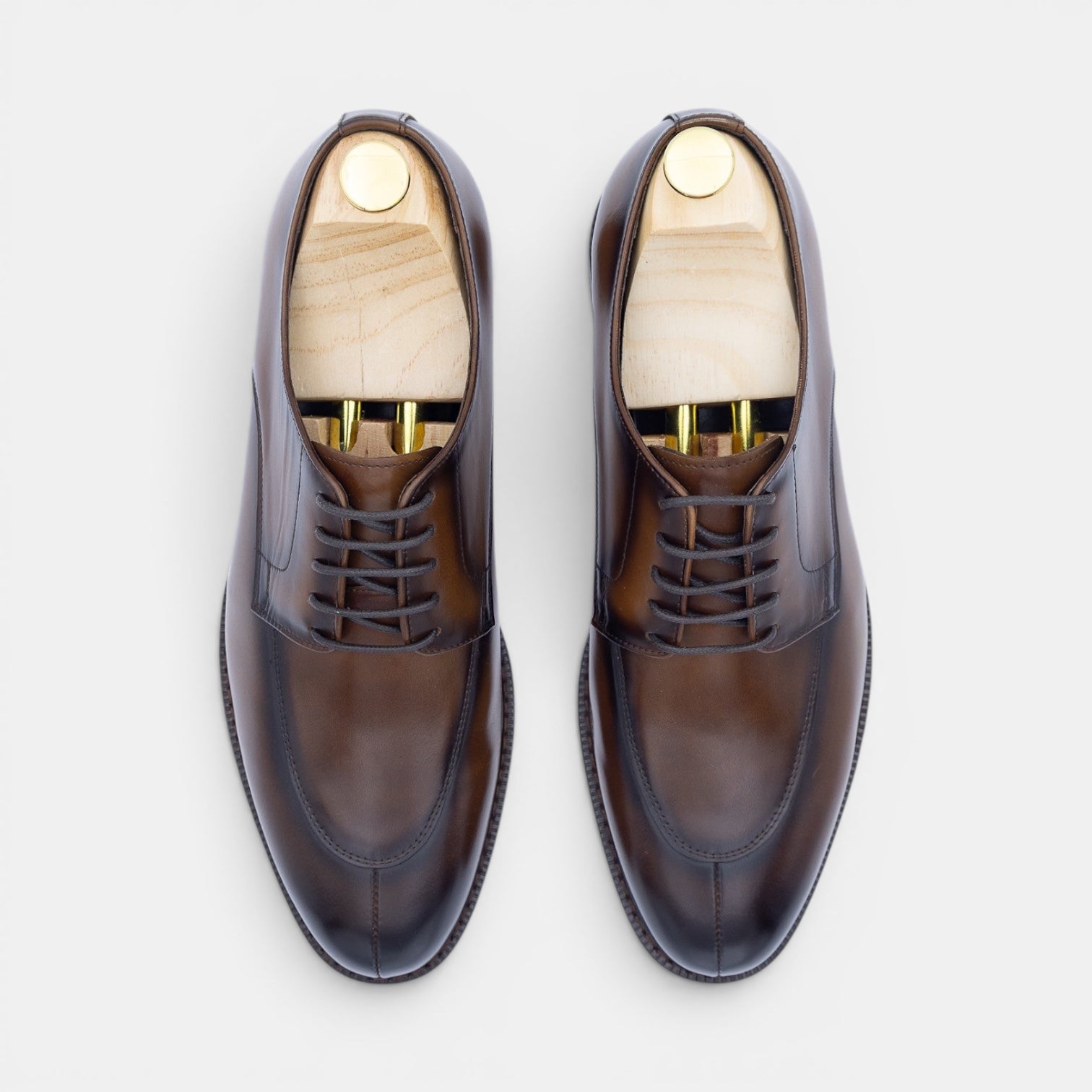 Barcon Getta Inc YOSEF A. split toe derby dress shoes in hand-burnished tobacco brown full grain leather with lug sole.