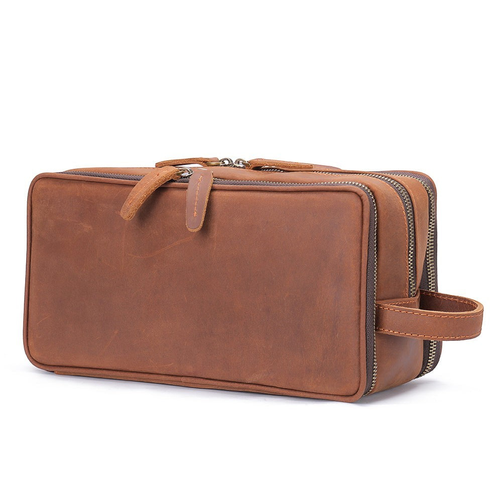 Barcon Getta Inc brown leather travel kit with dual zippers and side handle. Multifunctional toiletry bag.