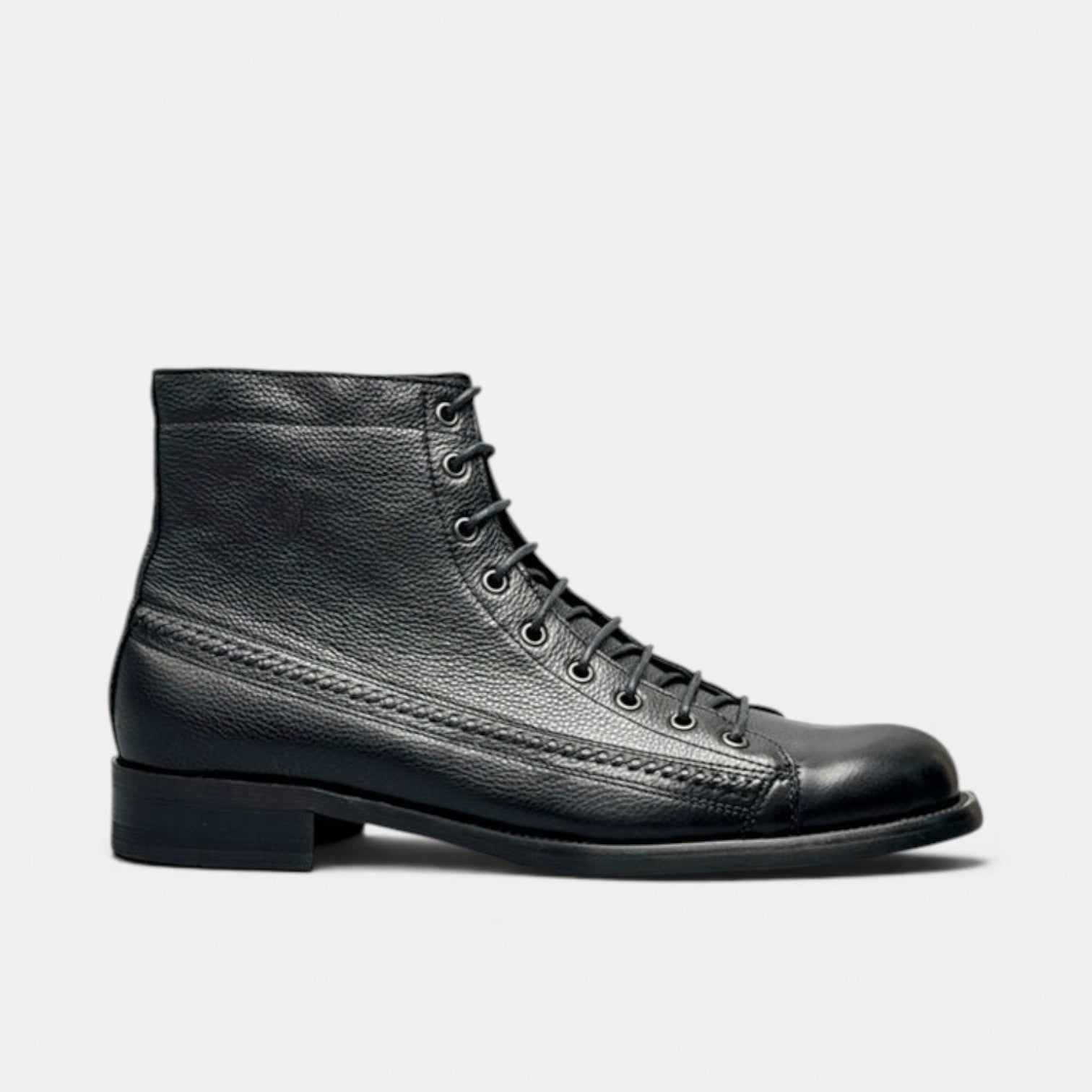 Barcon Getta Inc black leather lace-up ankle boots with textured finish and wingtip detail.