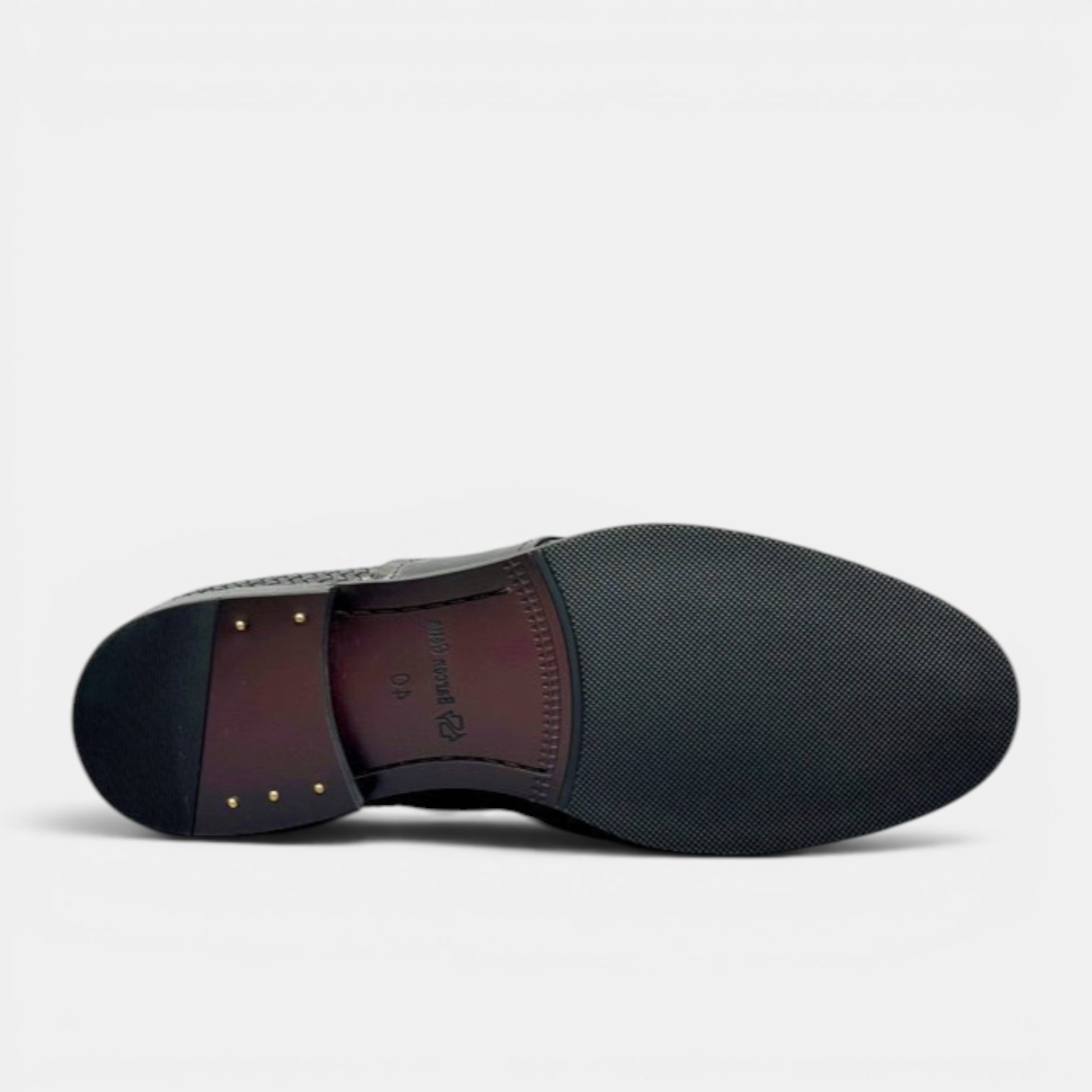 Barcon Getta Inc LIBREVILLE black leather woven tassel loafers, view of the sole and heel.