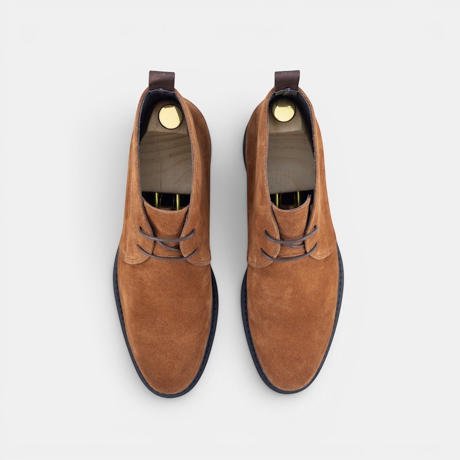 Barcon Getta Inc brown suede chukka boots with lace-up closure and durable lug sole.