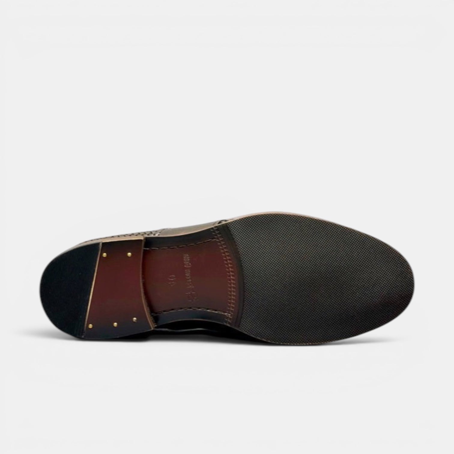 Barcon Getta Inc LIBREVILLE black woven leather tassel loafers with a rubber sole.