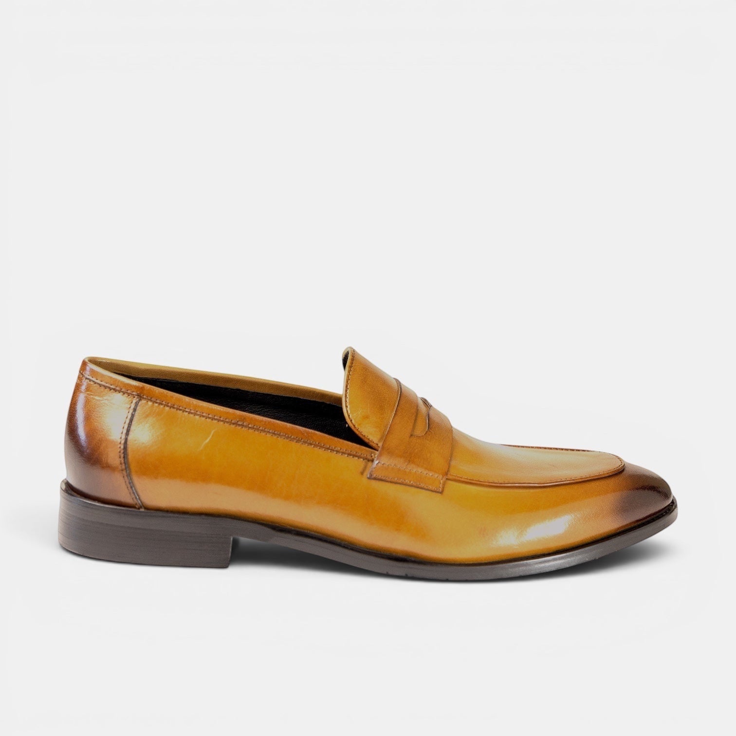 Barcon Getta Inc MONROVIA tan leather penny loafer with a sleek silhouette and traditional penny strap.