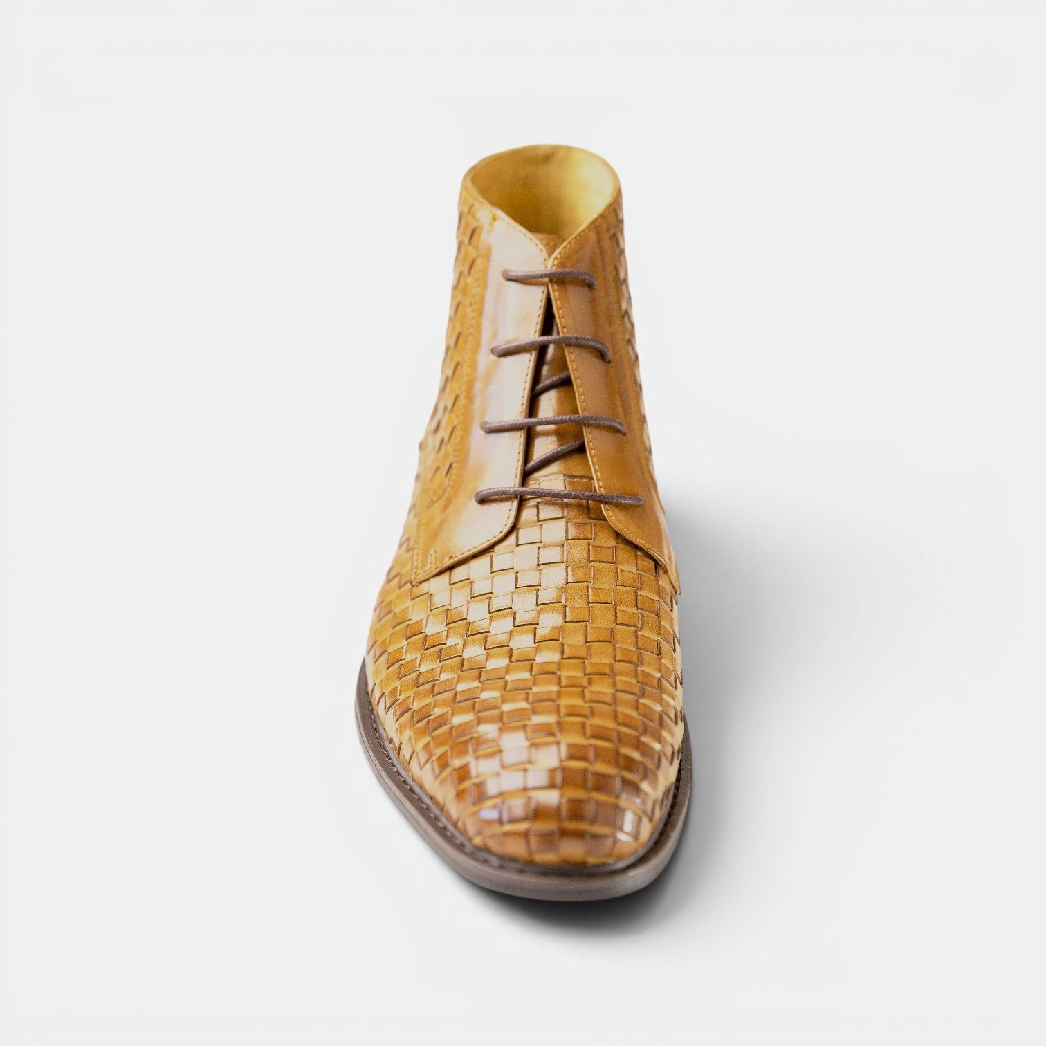 Barcon Getta Inc DAR ES SALAAM tan woven leather lace-up ankle boots with a classic design.