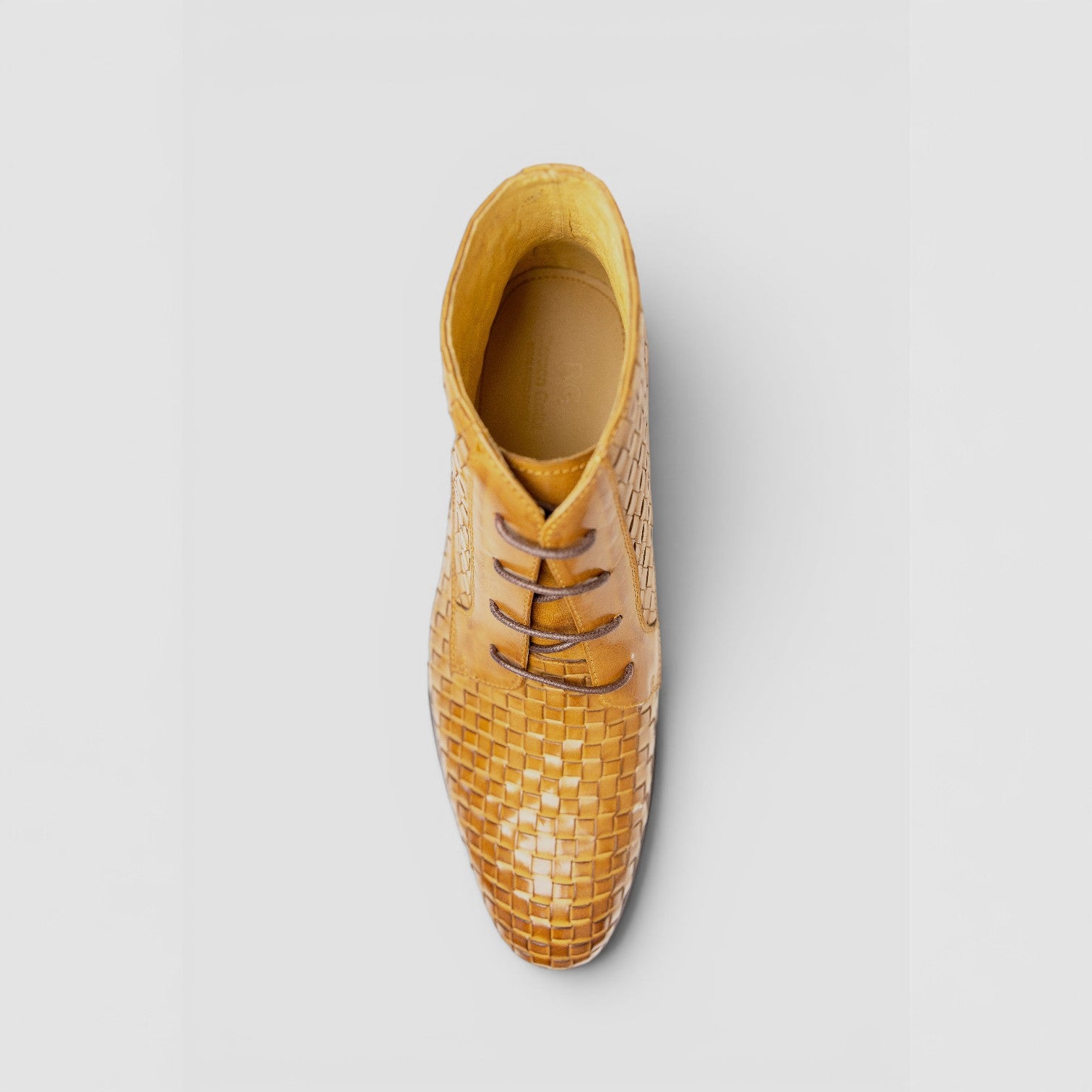 Barcon Getta Inc DAR ES SALAAM tan woven leather lace-up ankle boots with a classic design.