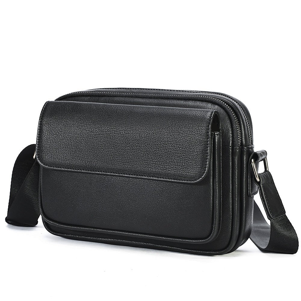 Barcon Getta Inc black full grain leather everyday sling shoulder bag with front flap pocket and adjustable strap.