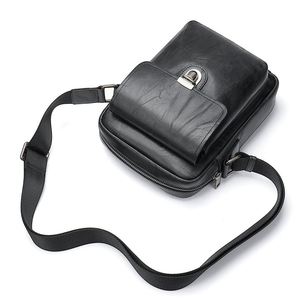 Barcon Getta Inc black Ethiopian leather OPENSIDE shoulder bag with front flap pocket and adjustable strap.