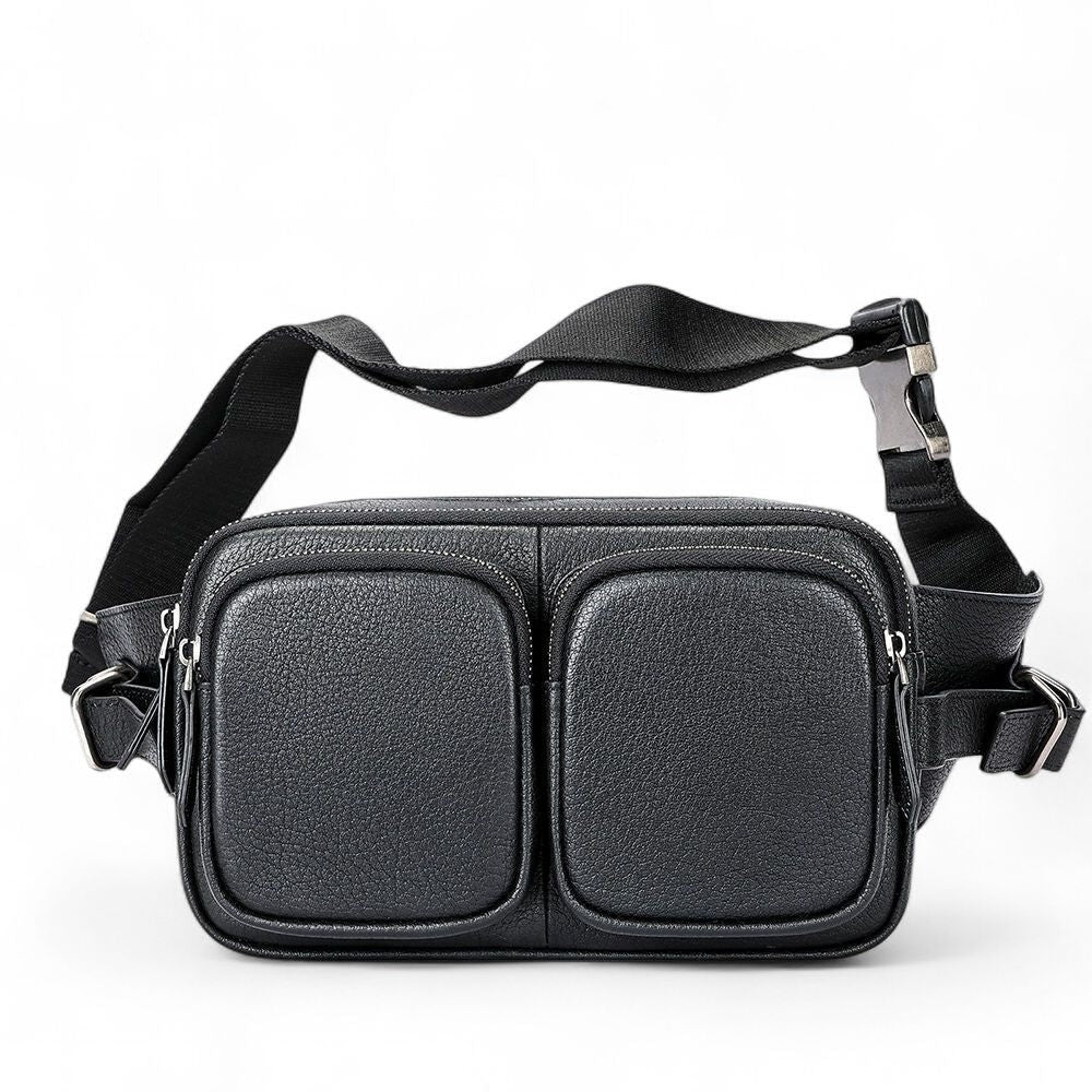 Barcon Getta Inc black genuine leather cross-body bag with two front zipper pockets and adjustable strap.