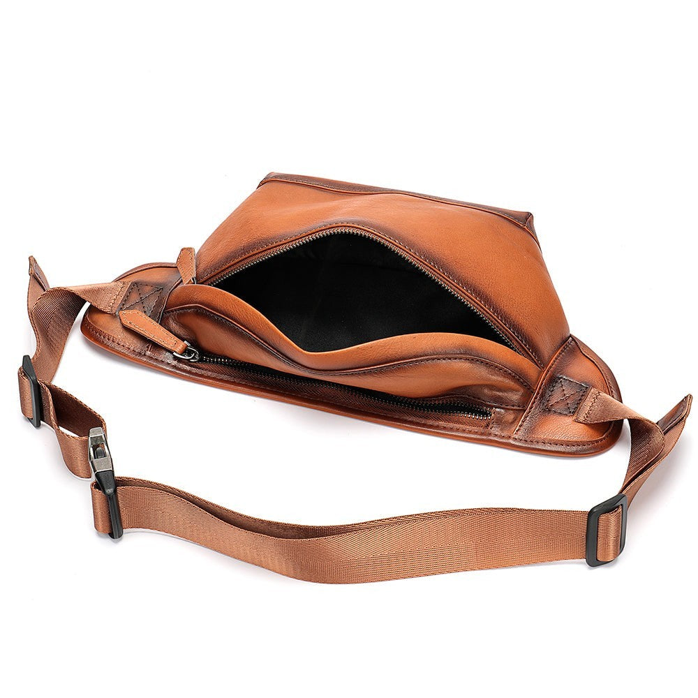 Barcon Getta Inc TANGIER tan genuine leather fanny pack with adjustable strap and zippered compartment.