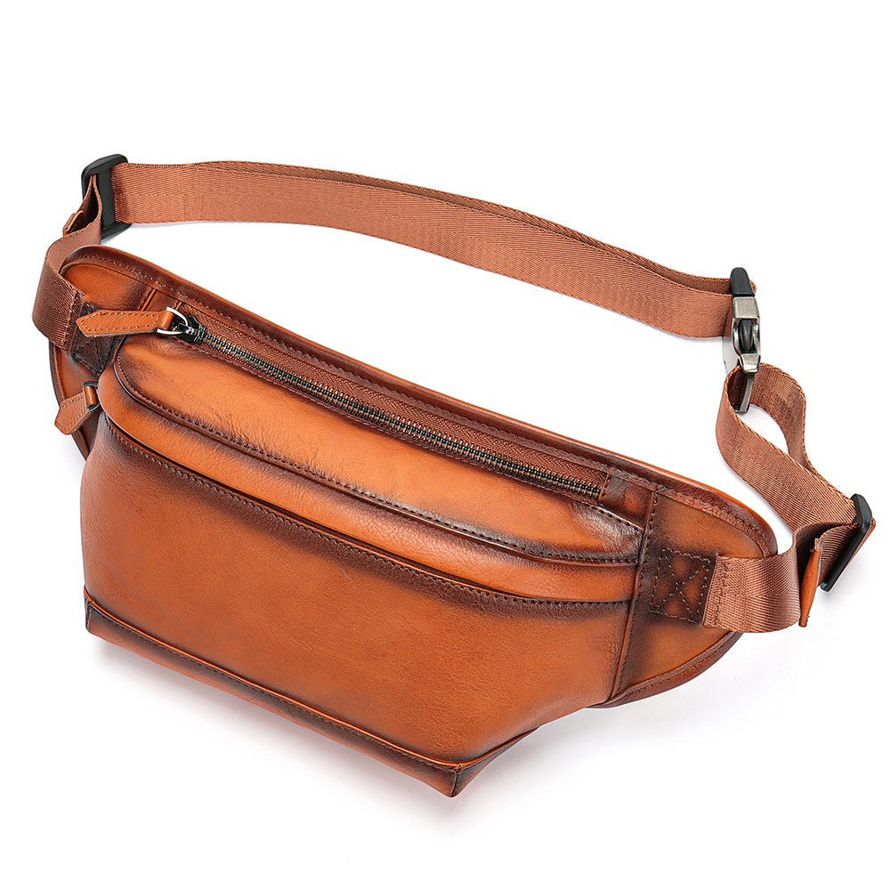 Barcon Getta Inc TANGIER tan genuine leather fanny pack with adjustable strap and zippered compartment.