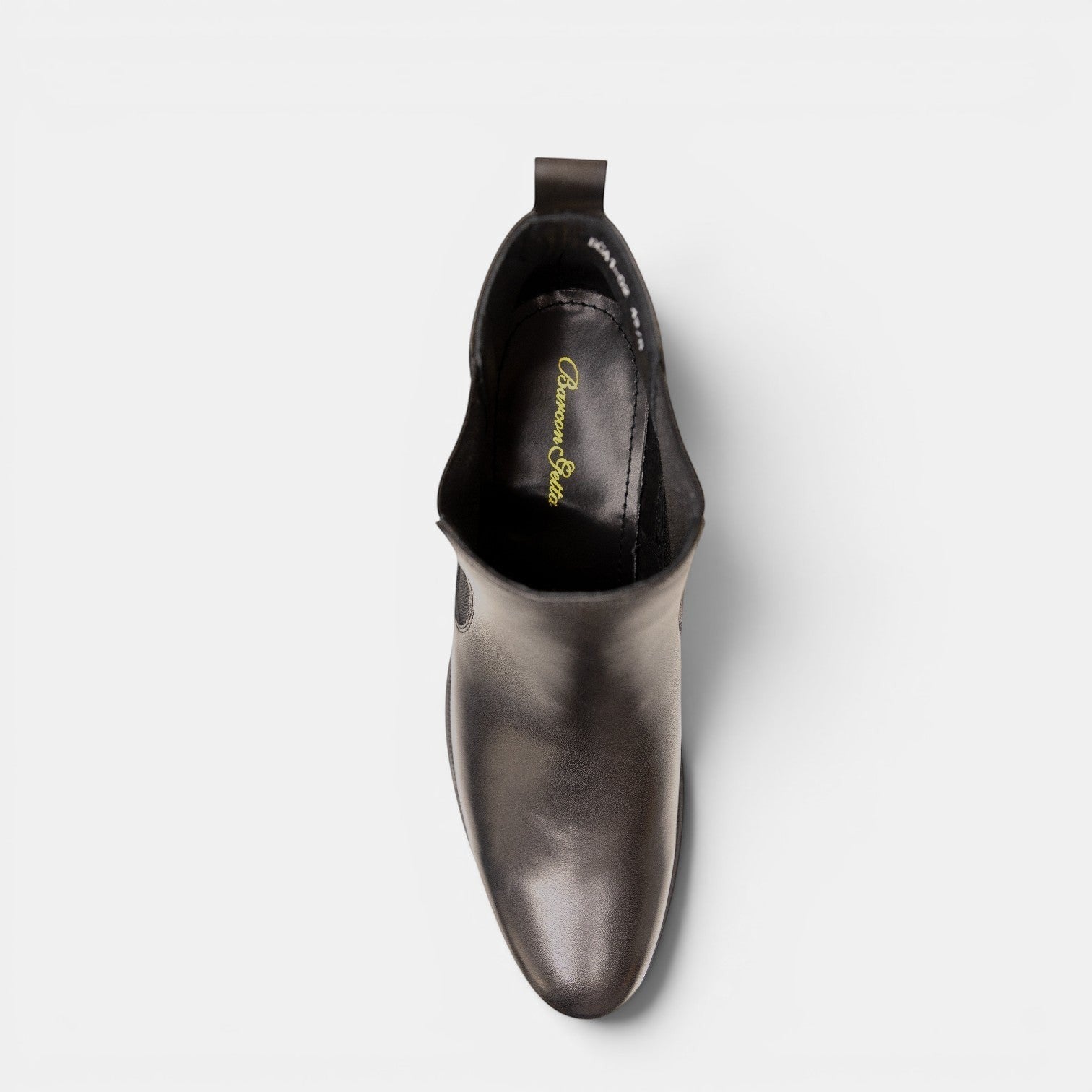 Barcon Getta black leather ACCRA Chelsea boots with elastic side panels and durable sole.