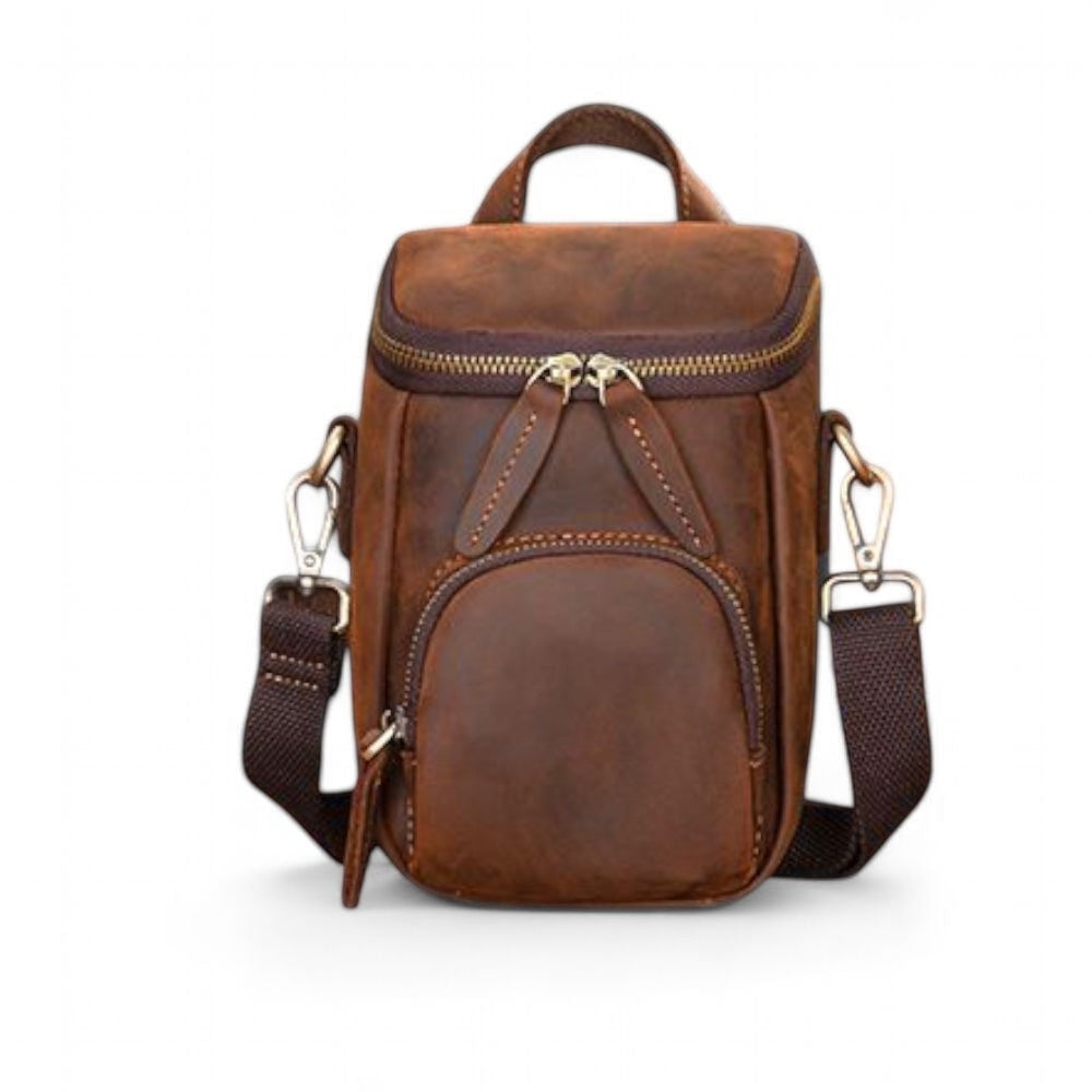 Barcon Getta Inc brown full grain leather crossbody bag with zippered main compartment and front pocket.