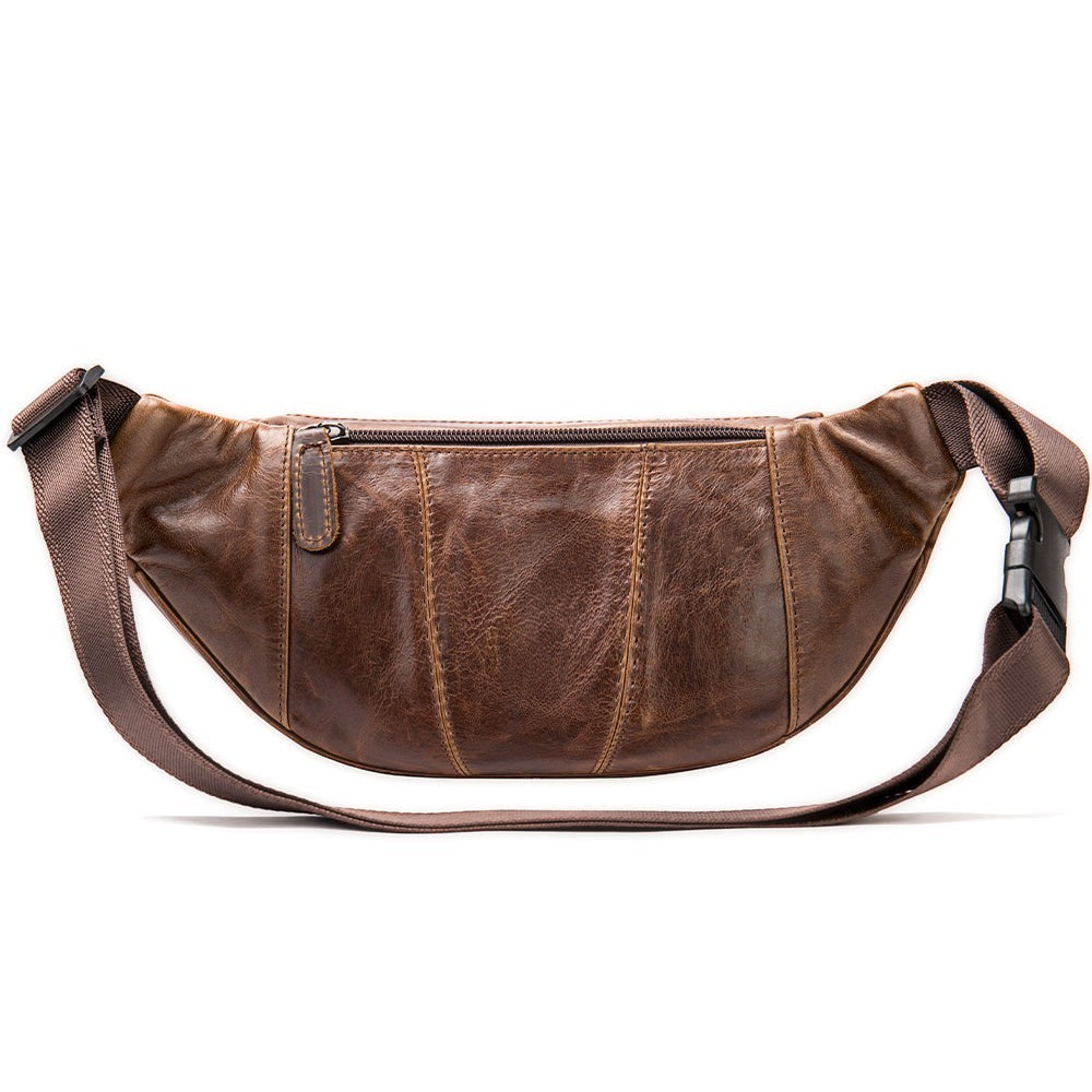 Barcon Getta Inc LAMU distressed brown leather fanny pack with zippered compartments and adjustable strap.