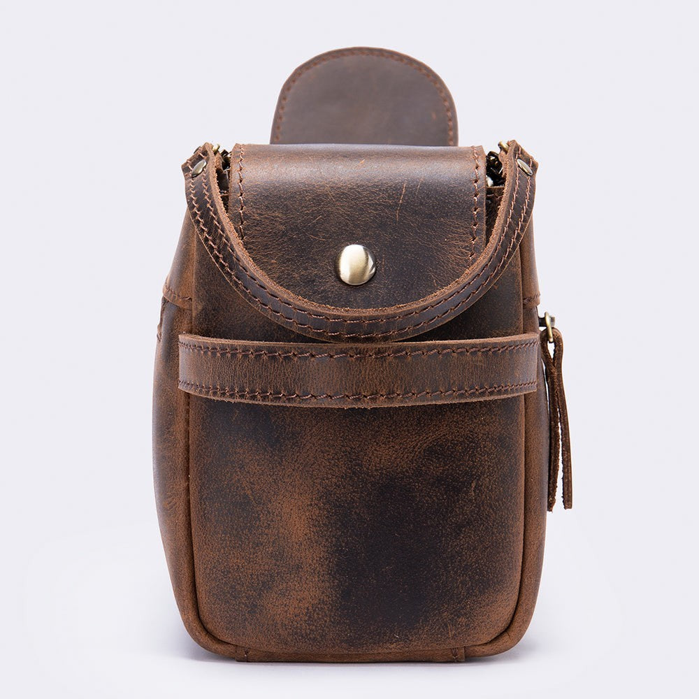 Barcon Getta Inc brown full grain leather dopp case with brass snap closure and external zipper pocket.