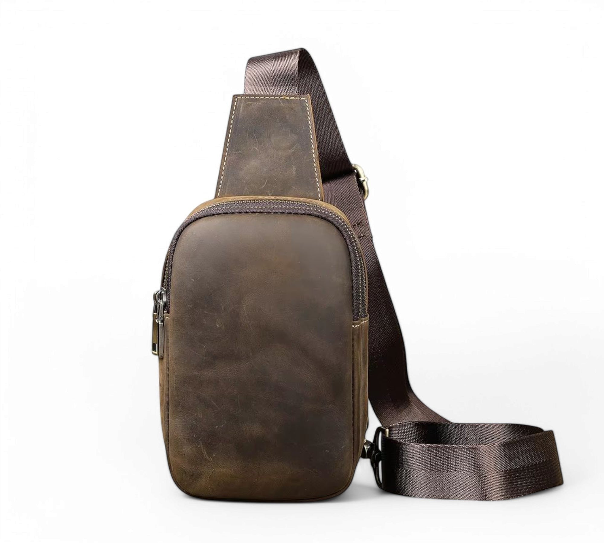 Barcon Getta Inc TRAVERSE cross-body bag in distressed brown genuine leather with adjustable strap and multiple compartments.