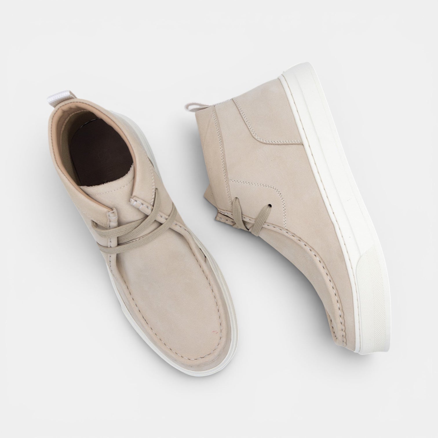 Barcon Getta Inc beige suede chukka sneaker boots with white rubber soles and lace-up closure.