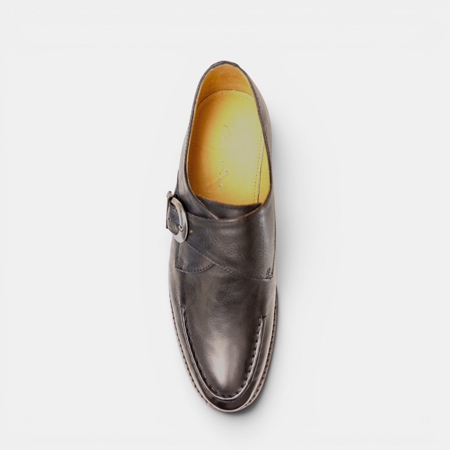 Barcon Getta Inc BAMAKO gunmetal charcoal black single monk strap dress shoe with silver buckle and apron toe seam.