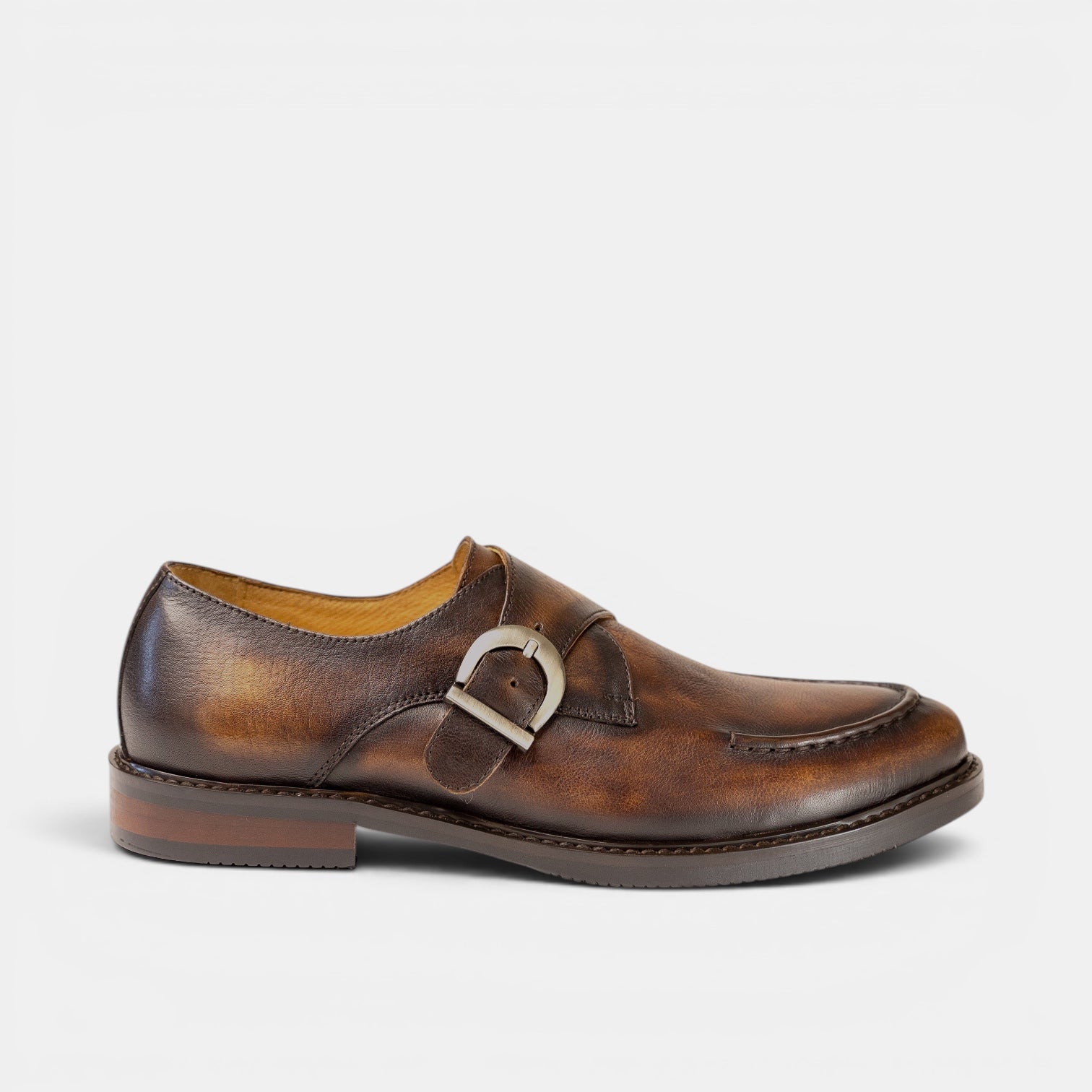 Barcon Getta Inc BAMAKO single monk strap dress shoes in burnished tobacco brown full grain leather with silver buckle and apron toe.