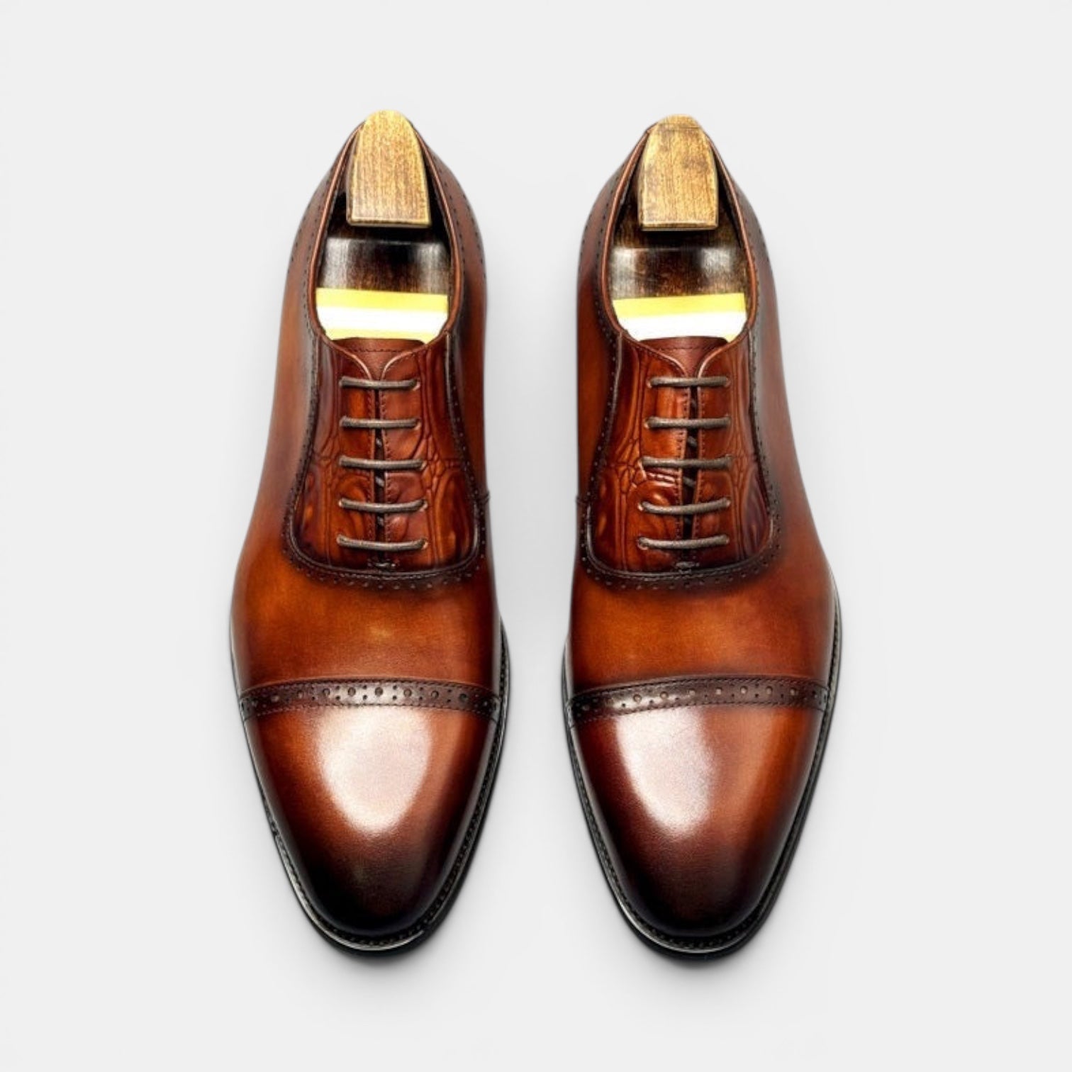 Barcon Getta Inc BISSAU burnished tan full grain leather cap toe Oxford dress shoes with brogue detailing.