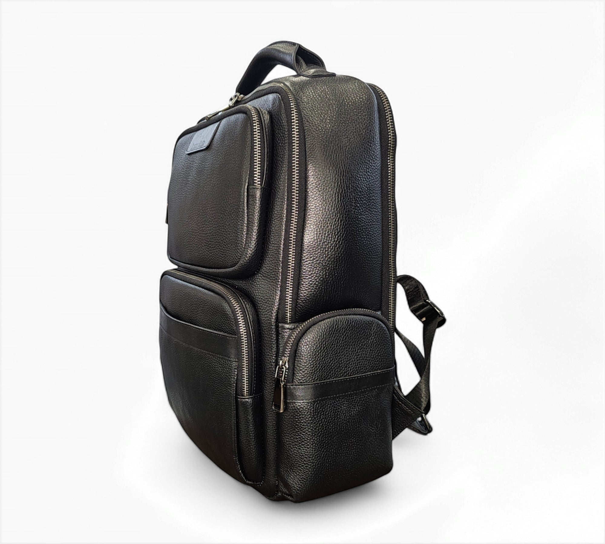 Barcon Getta Inc black full grain leather backpack with multiple zippered pockets and padded straps.