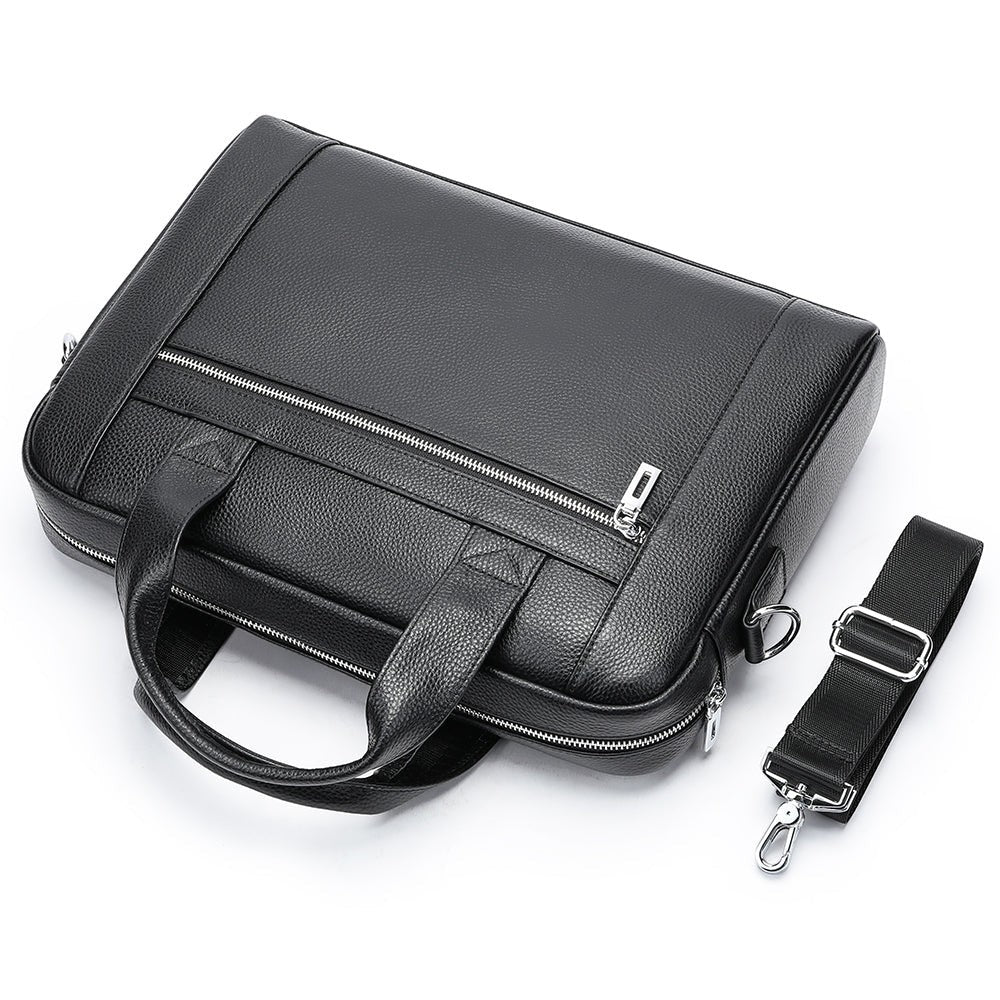 Barcon Getta Inc black pebbled leather briefcase with silver hardware, top handles, and detachable shoulder strap. Fits up to 15" laptop.
