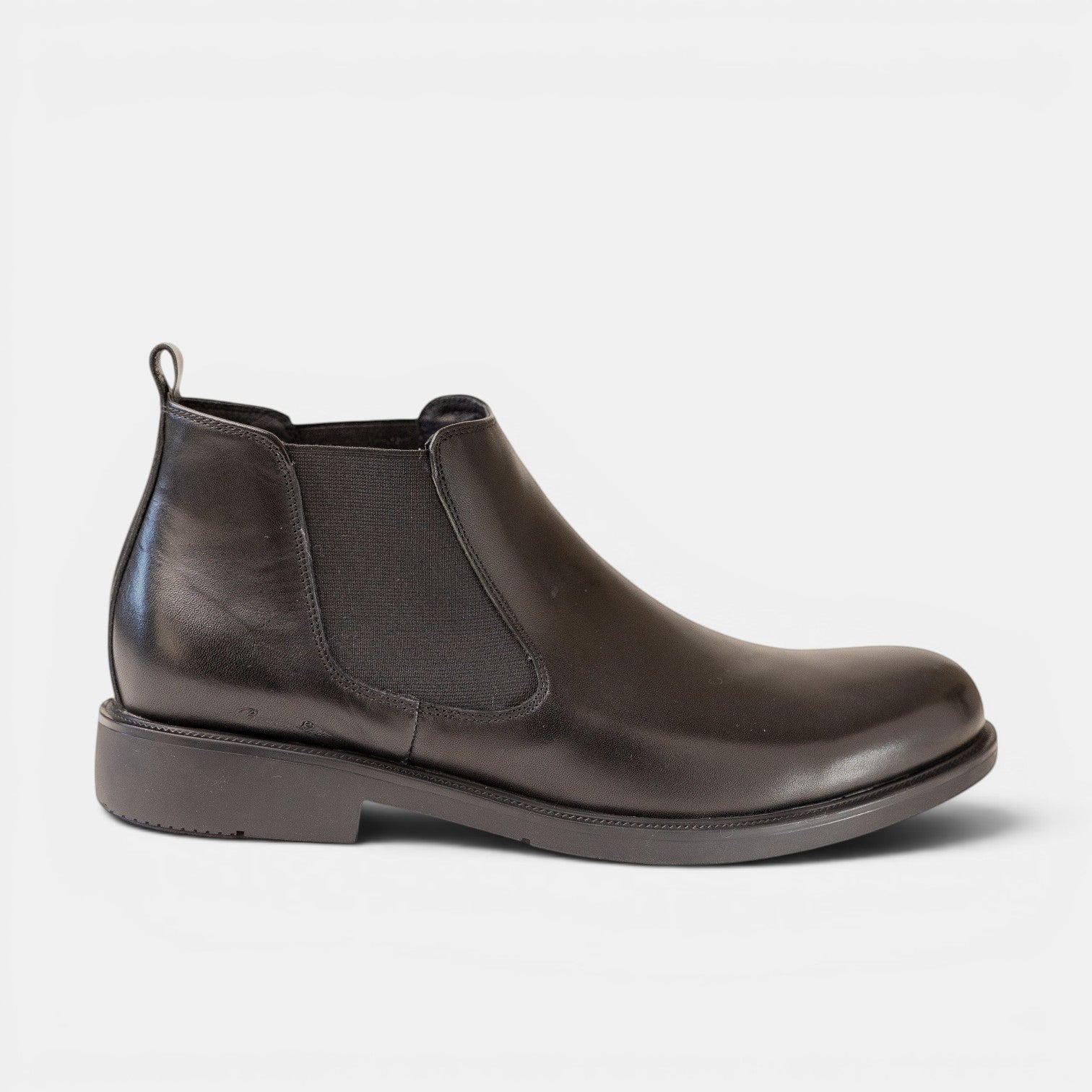 Barcon Getta Inc black leather Chelsea boots with elastic side panels and a durable sole.