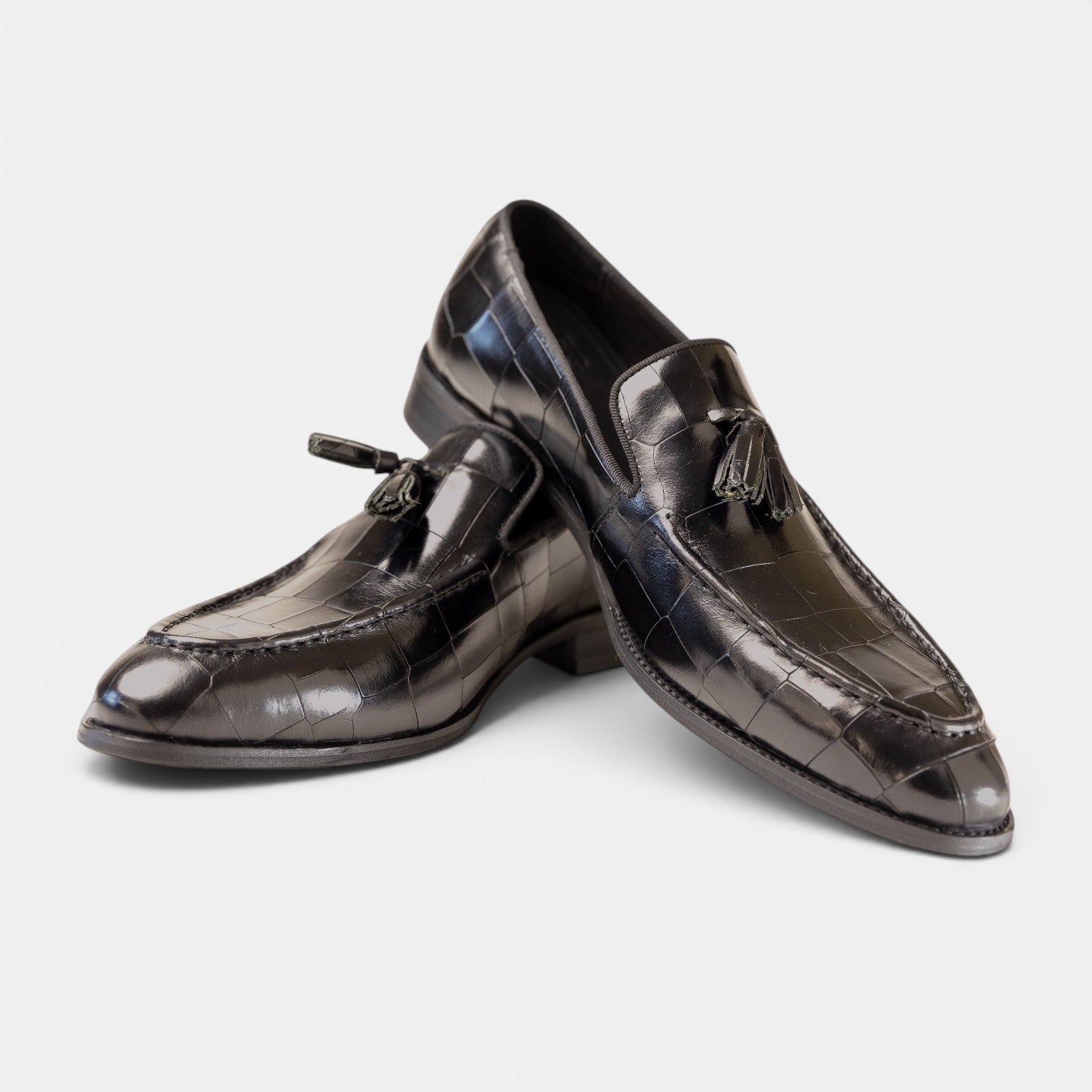 Barcon Getta Inc. YAOUNDE black croc-embossed full-grain leather tassel loafers with silk tassels.