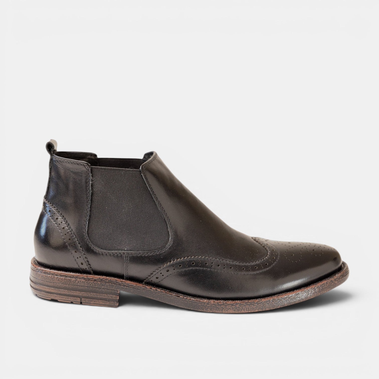 Barcon Getta Inc black leather wingtip Chelsea boots with elastic side panels and brogue detailing.