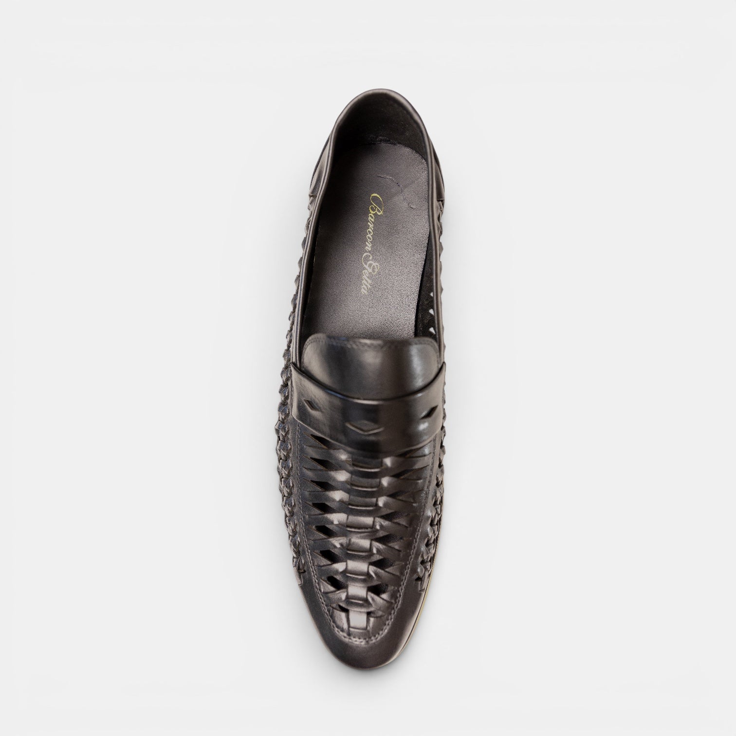 Barcon Getta Inc MASSAWA black leather woven slip-on loafers for men. Open weave design.