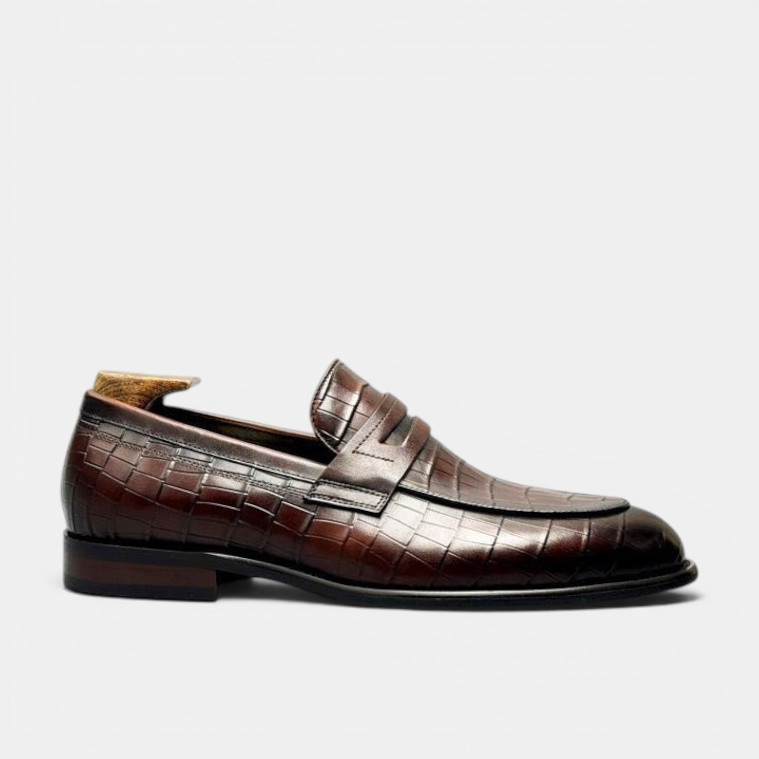 Barcon Getta Inc BRAZZAVILLE men's dark brown leather penny loafers with crocodile embossing and a sleek silhouette.