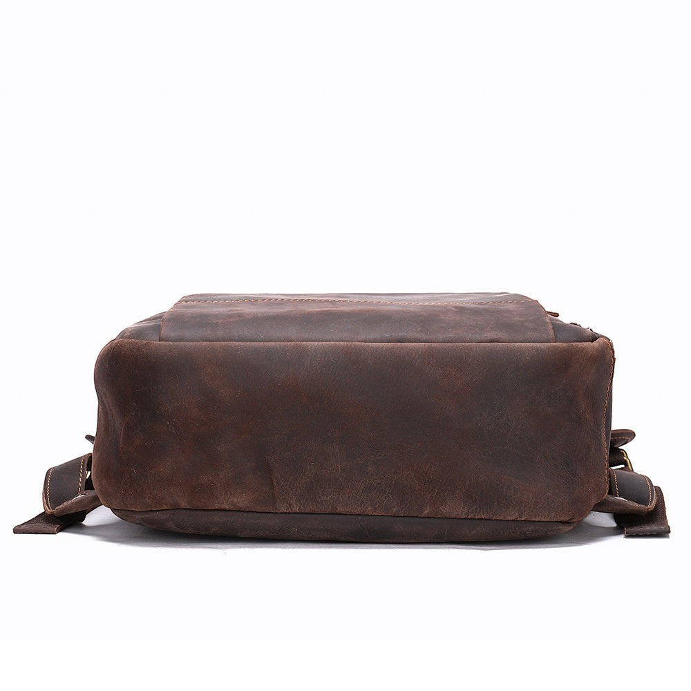 Barcon Getta Inc brown distressed genuine leather EQUIP backpack with multiple pockets and adjustable straps.