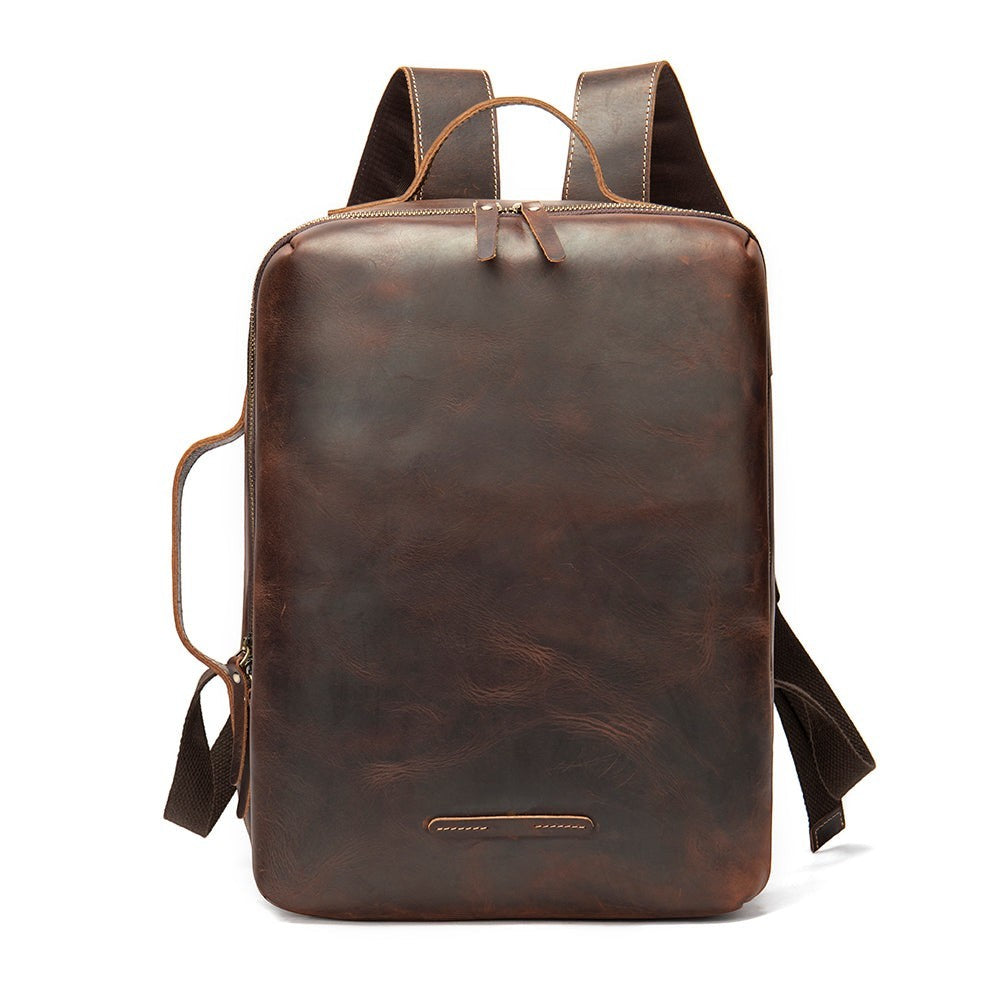 Barcon Getta Inc brown leather TravelLite backpack with dual zip closure and top handle. Multifunctional carry-on.