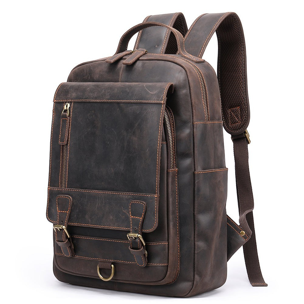 Barcon Getta Inc brown genuine leather backpack with multiple compartments and adjustable padded straps.