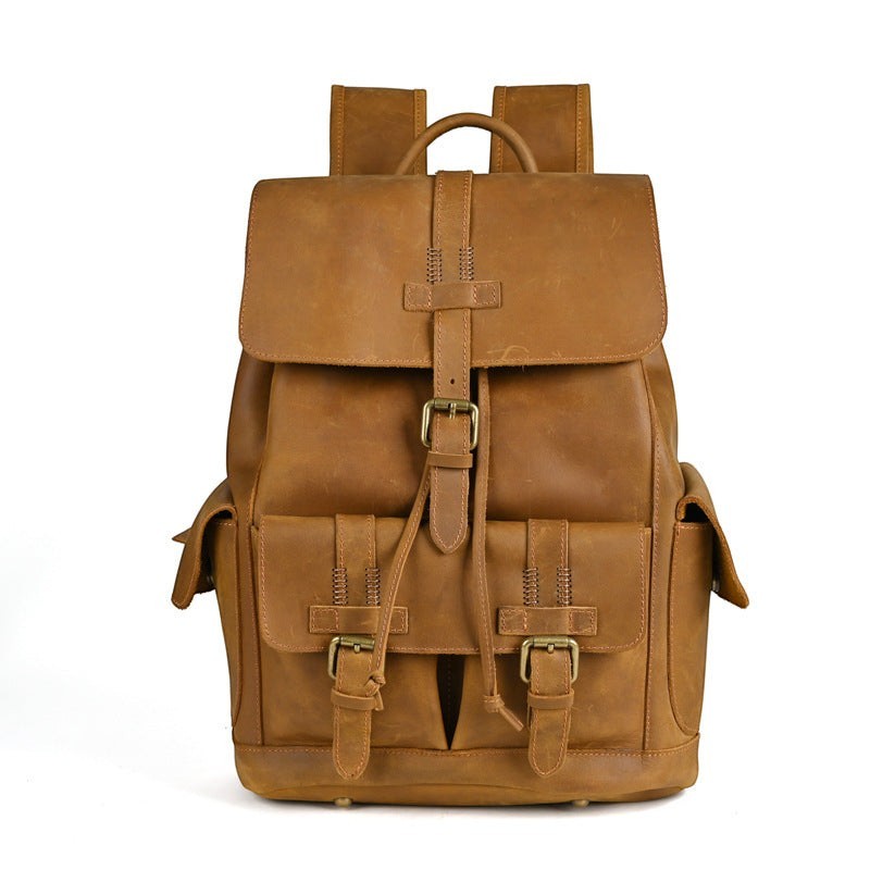 Barcon Getta Inc brown genuine leather Sharp-Carry backpack with brass hardware and multiple exterior pockets.