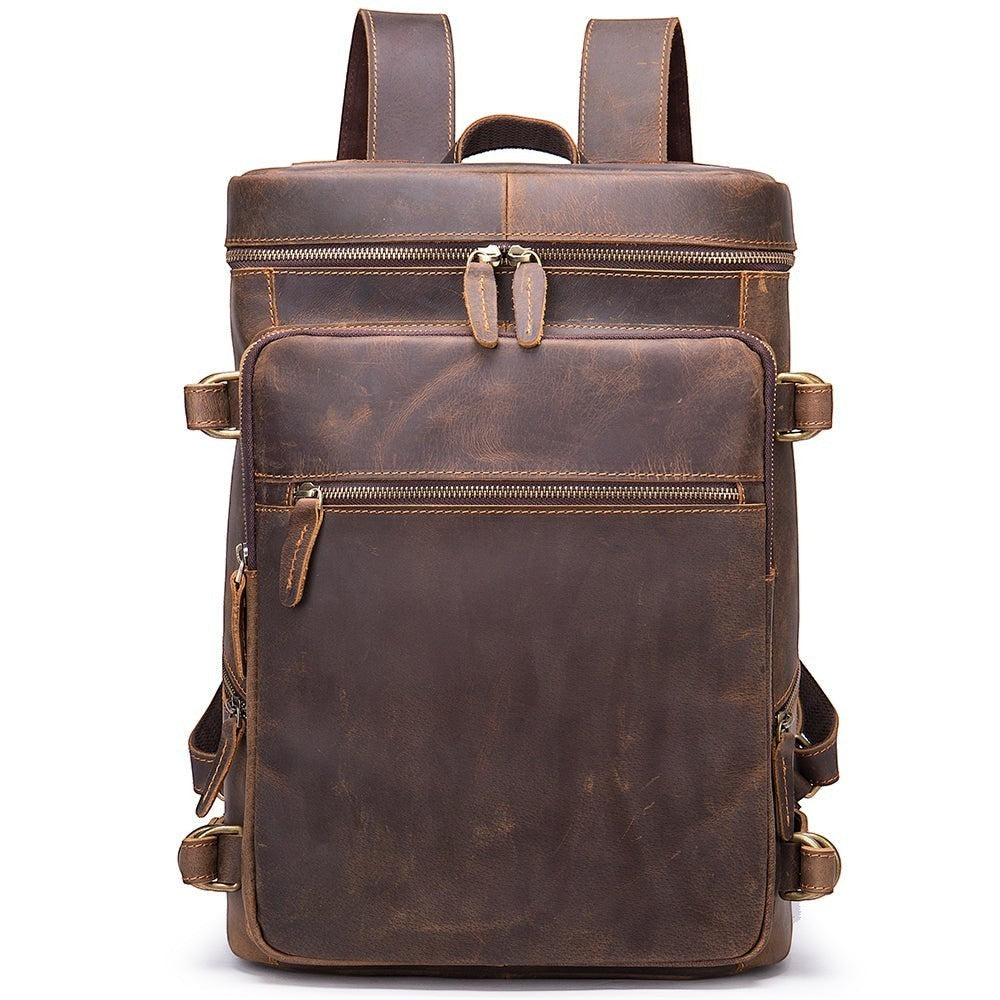 Barcon Getta Inc PATHWAY brown full grain leather backpack with multiple zippered pockets and adjustable straps.
