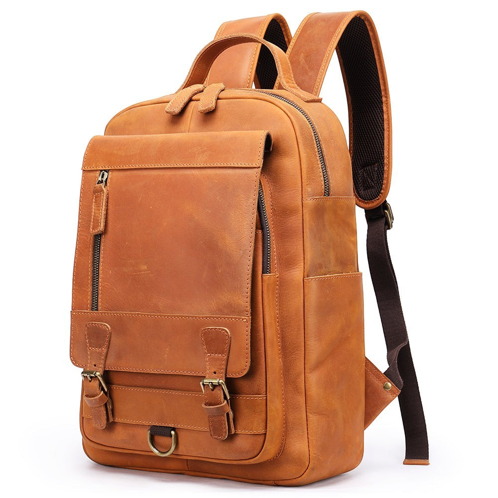 Barcon Getta Inc brown genuine leather backpack with multiple compartments and adjustable padded straps.