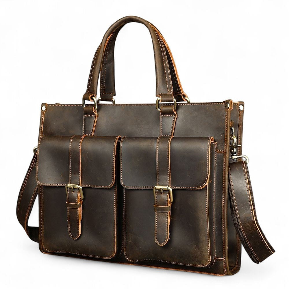 Barcon Getta Inc dark brown Ethiopian leather briefcase with two front buckle pockets and adjustable shoulder strap.