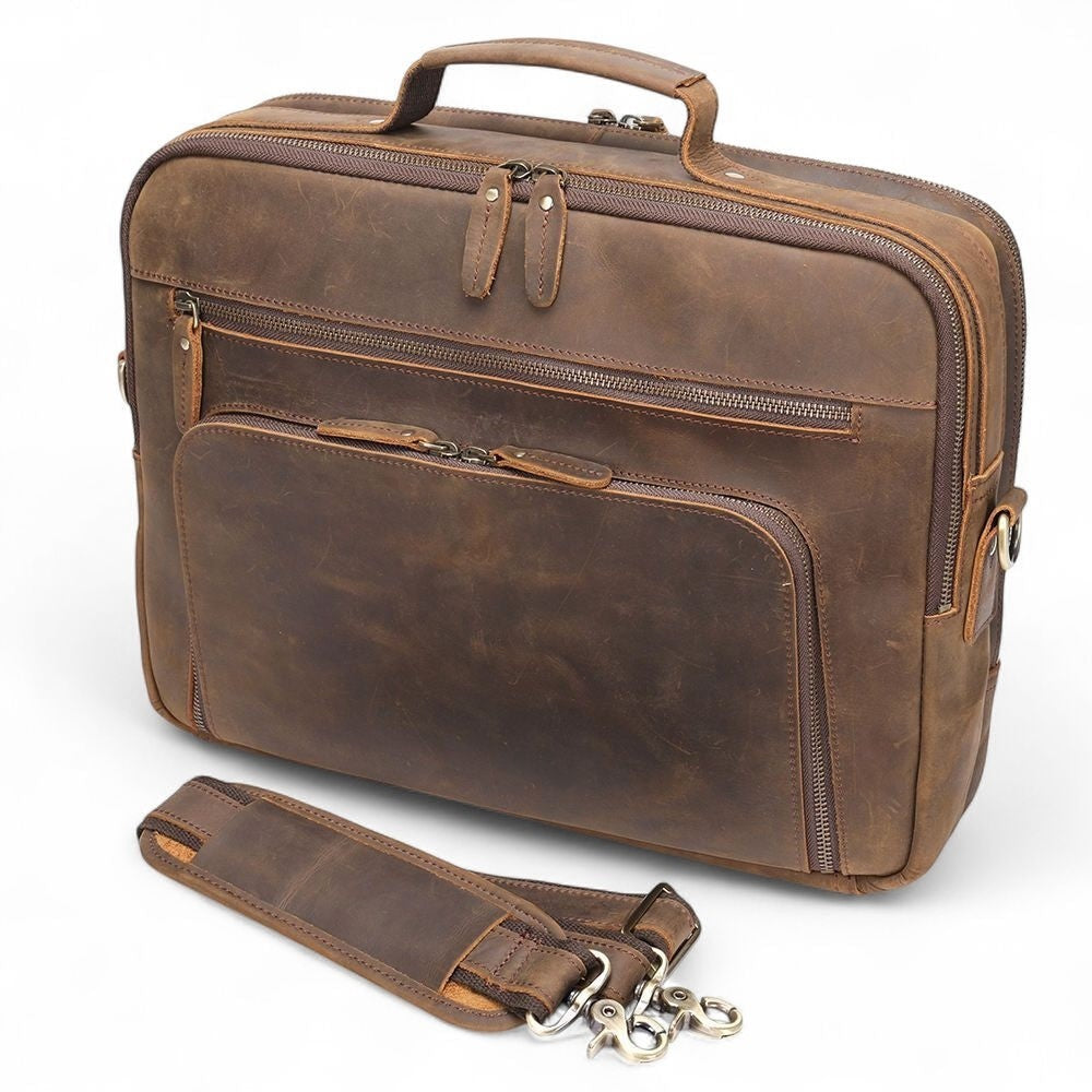 Barcon Getta Inc The Daily Operator brown leather briefcase with multiple pockets and detachable strap.