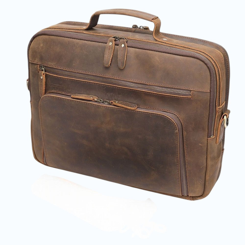 Barcon Getta Inc brown distressed leather briefcase with multiple pockets and detachable shoulder strap. Fits up to 15" laptop.