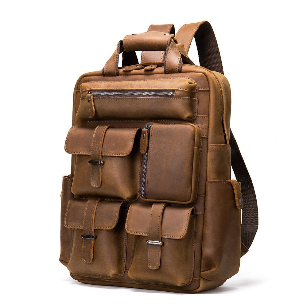 Barcon Getta Inc brown distressed leather multi-pocket backpack with adjustable straps and top handle.