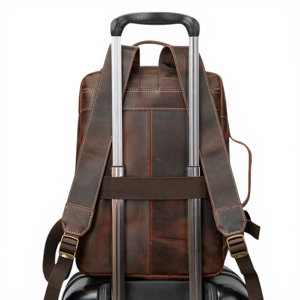 Barcon Getta Inc brown leather TravelLite backpack with trolley strap and adjustable straps.