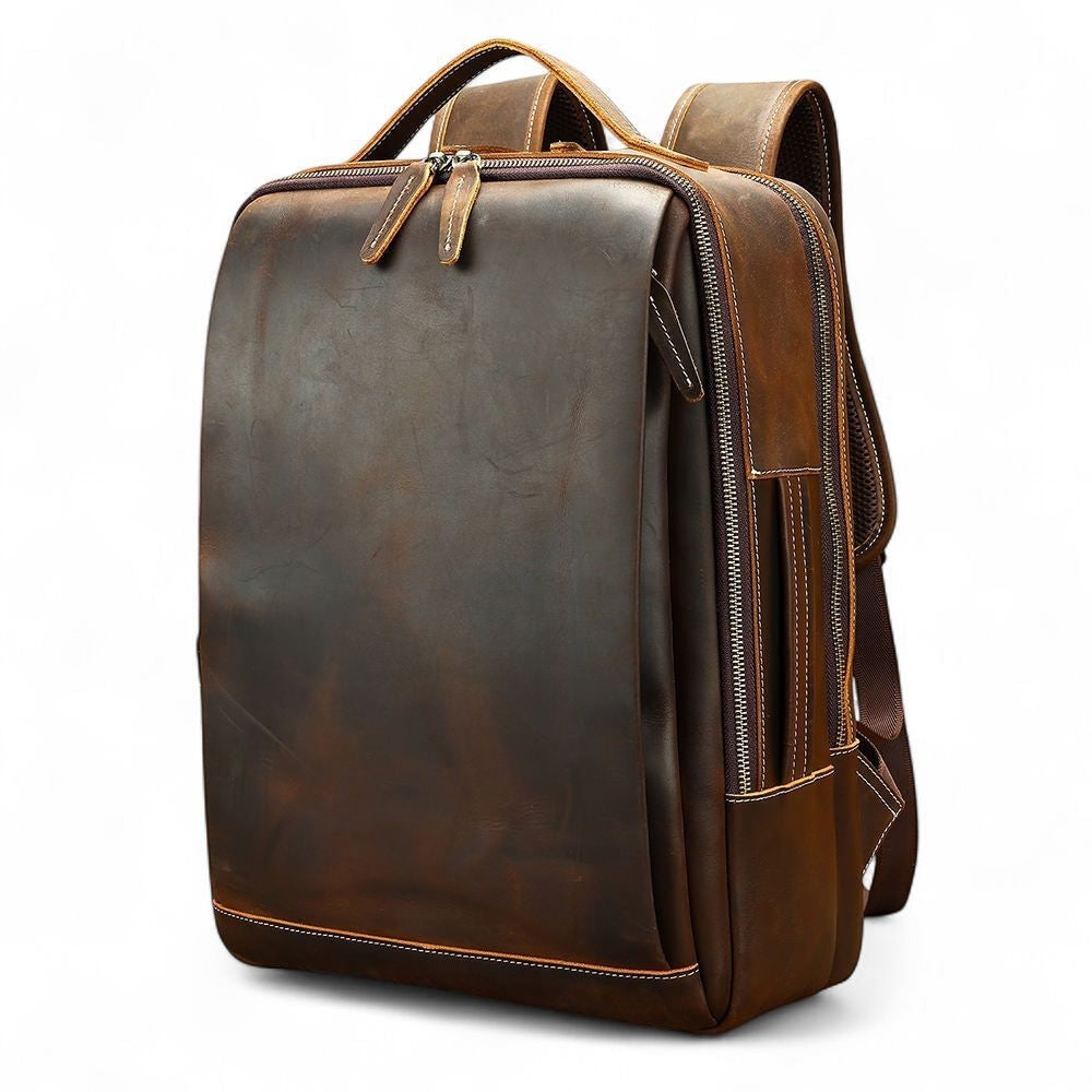 Barcon Getta Inc WORKDAY brown full grain leather backpack with multiple pockets and adjustable straps.