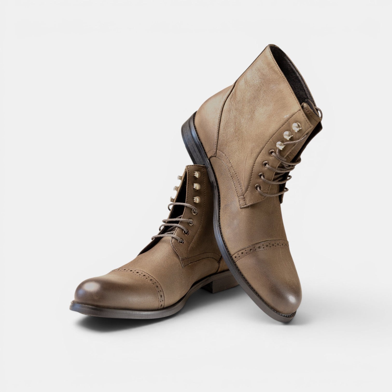 Barcon Getta Inc PRETORIA brown suede lace-up cap toe boots with brogue detailing.