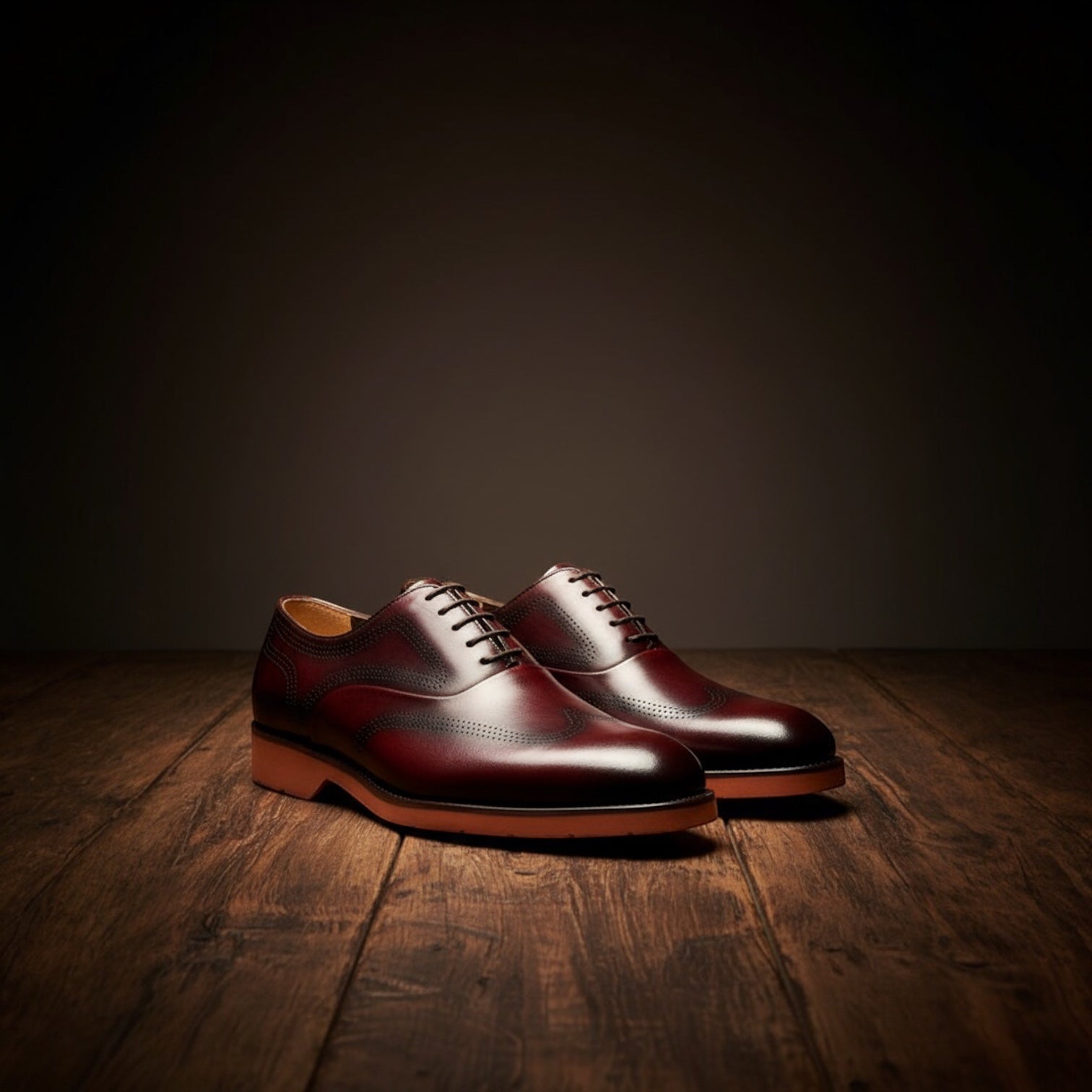 Barcon Getta Inc burgundy leather wingtip brogue Oxford dress shoes with burnt orange soles.