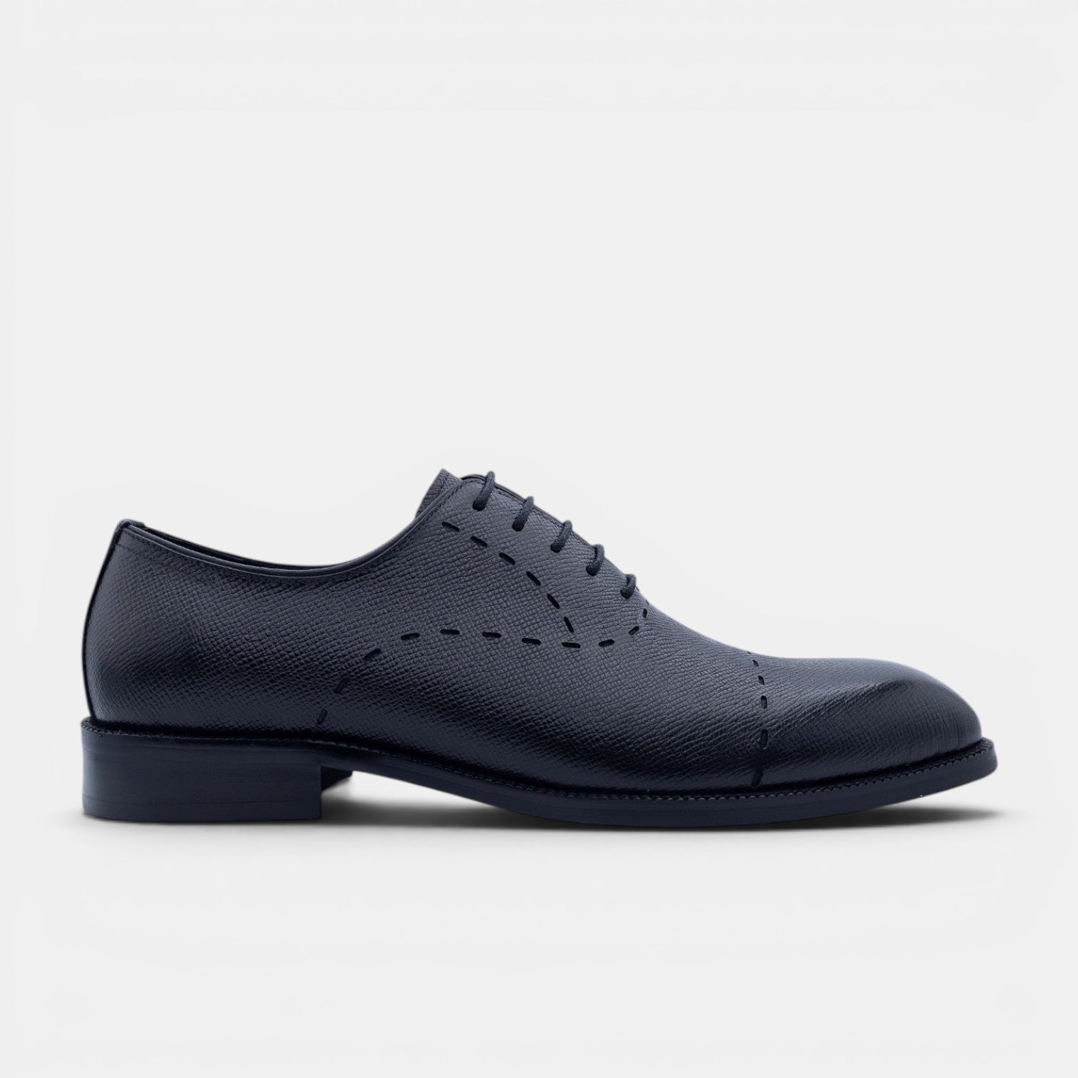 Barcon Getta Inc. charcoal grey Saffiano embossed full grain leather Oxford dress shoe with decorative stitching.